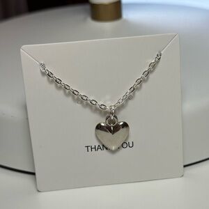 Silver heart charm necklace
